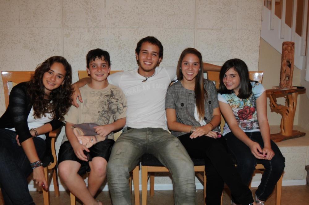 Shirley and Daniel as kids, with friends