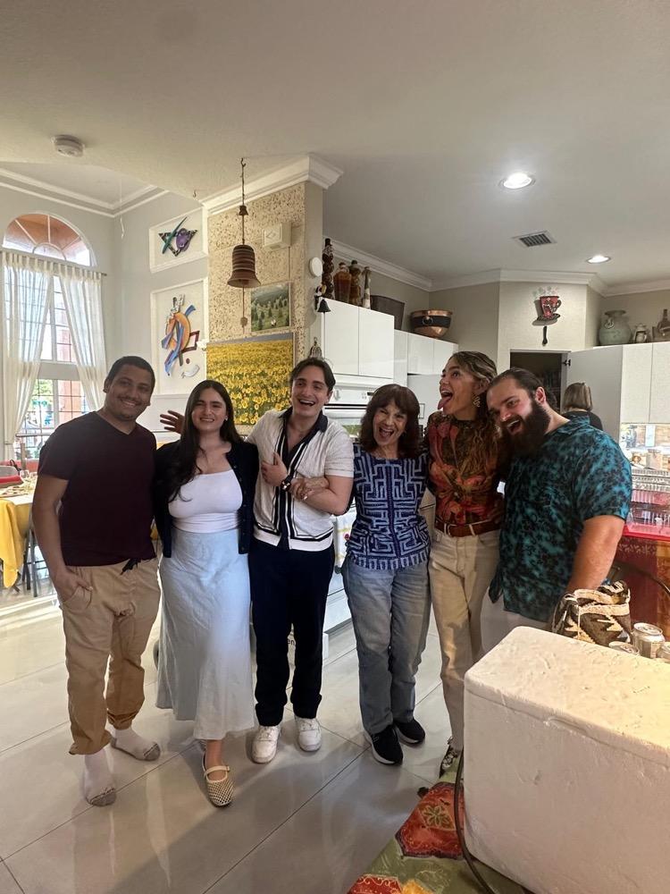 Shirley and Daniel with family and friends