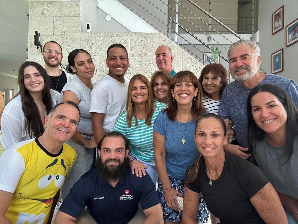 Shirley and Daniel with family and friends